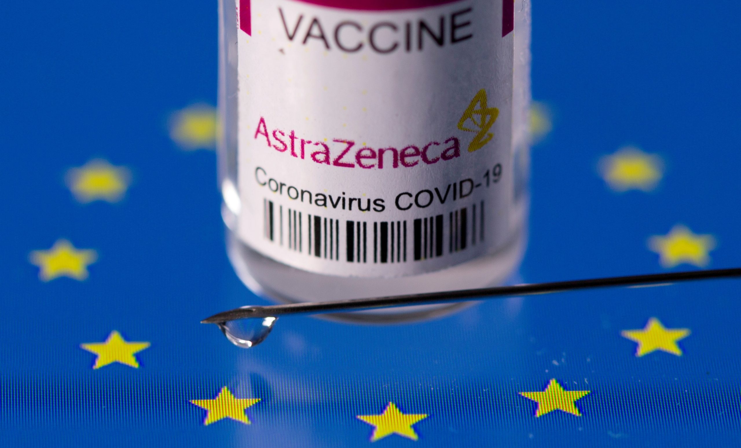 FILE PHOTO: Vial labelled "AstraZeneca coronavirus disease (COVID-19) vaccine" placed on displayed EU flag is seen in this illustration picture FILE PHOTO: Vial labelled "AstraZeneca coronavirus disease (COVID-19) vaccine" placed on displayed EU flag is seen in this illustration picture taken March 24, 2021. REUTERS/Dado Ruvic/Illustration/File Photo DADO RUVIC