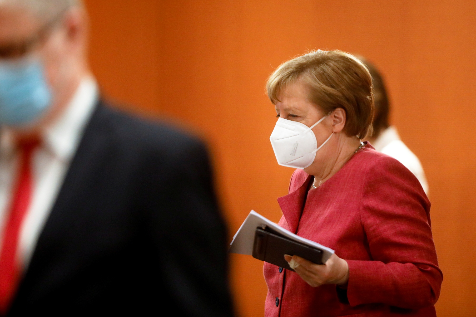 German Chancellor Merkel attends weekly cabinet meeting in Berlin German Chancellor Angela Merkel arrives for the weekly cabinet meeting of the German government at the chancellery in Berlin, Germany, April 27, 2021. Markus Schreiber/Pool via REUTERS POOL