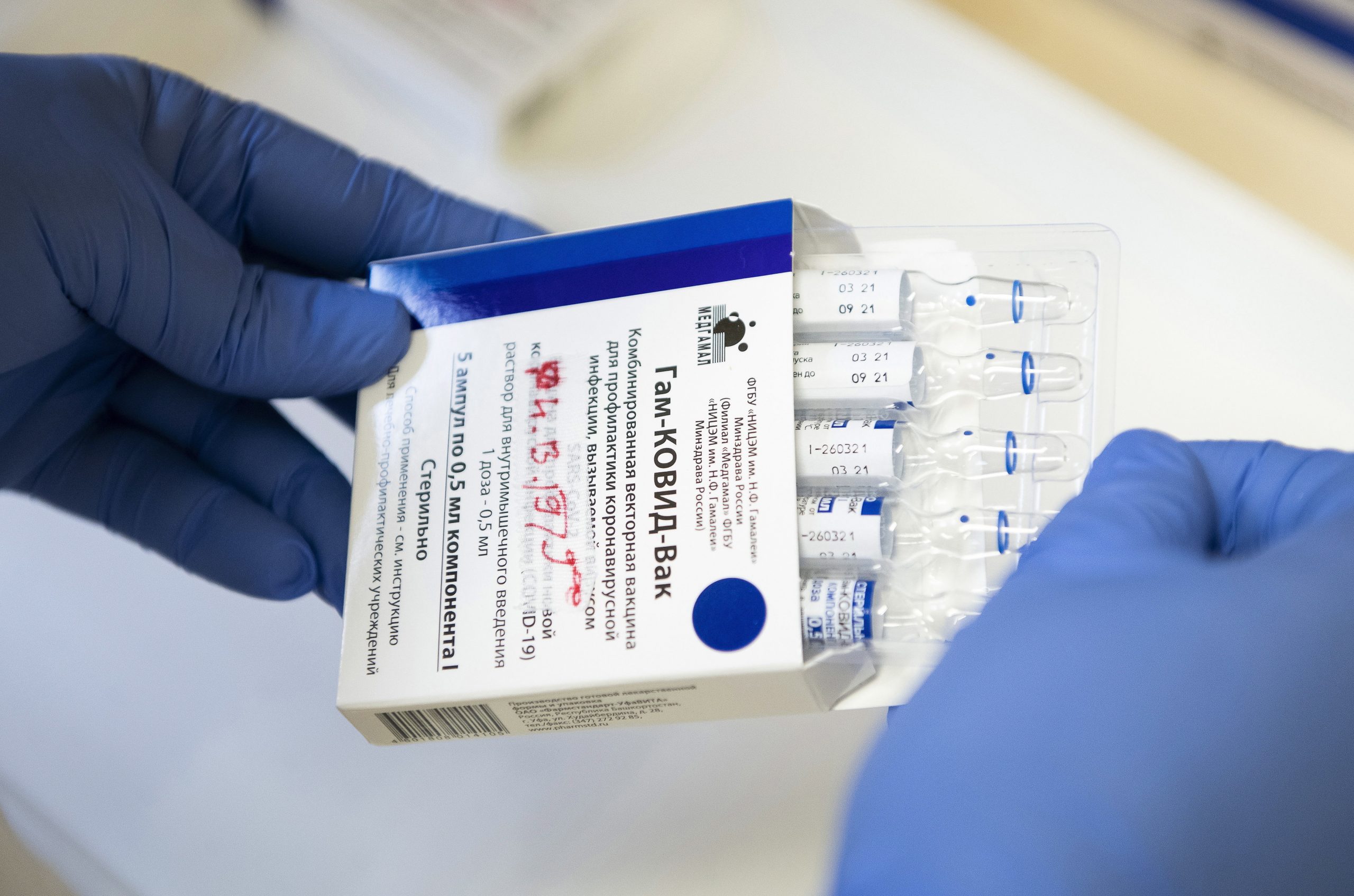 epa09132756 Vials of the Russian vaccine Sputnik V are prepared to be inoculated to patients in Josa Andras Training Hospital in Nyiregyhaza, Hungary, 13 April 2021, as the vaccination with Sputnik V (Russian name: Gam-KOVID-Vak) against the new coronavirus continues in the country.  EPA/Attila Balazs HUNGARY OUT