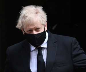 epa09134628 British Prime Minister Boris Johnson departs 10 Downing Street for Prime Minister Questions at parliament in London, Britain, 14 April 2021.  EPA/ANDY RAIN