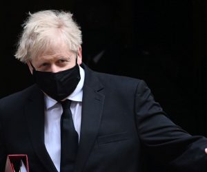 epa09134628 British Prime Minister Boris Johnson departs 10 Downing Street for Prime Minister Questions at parliament in London, Britain, 14 April 2021.  EPA/ANDY RAIN