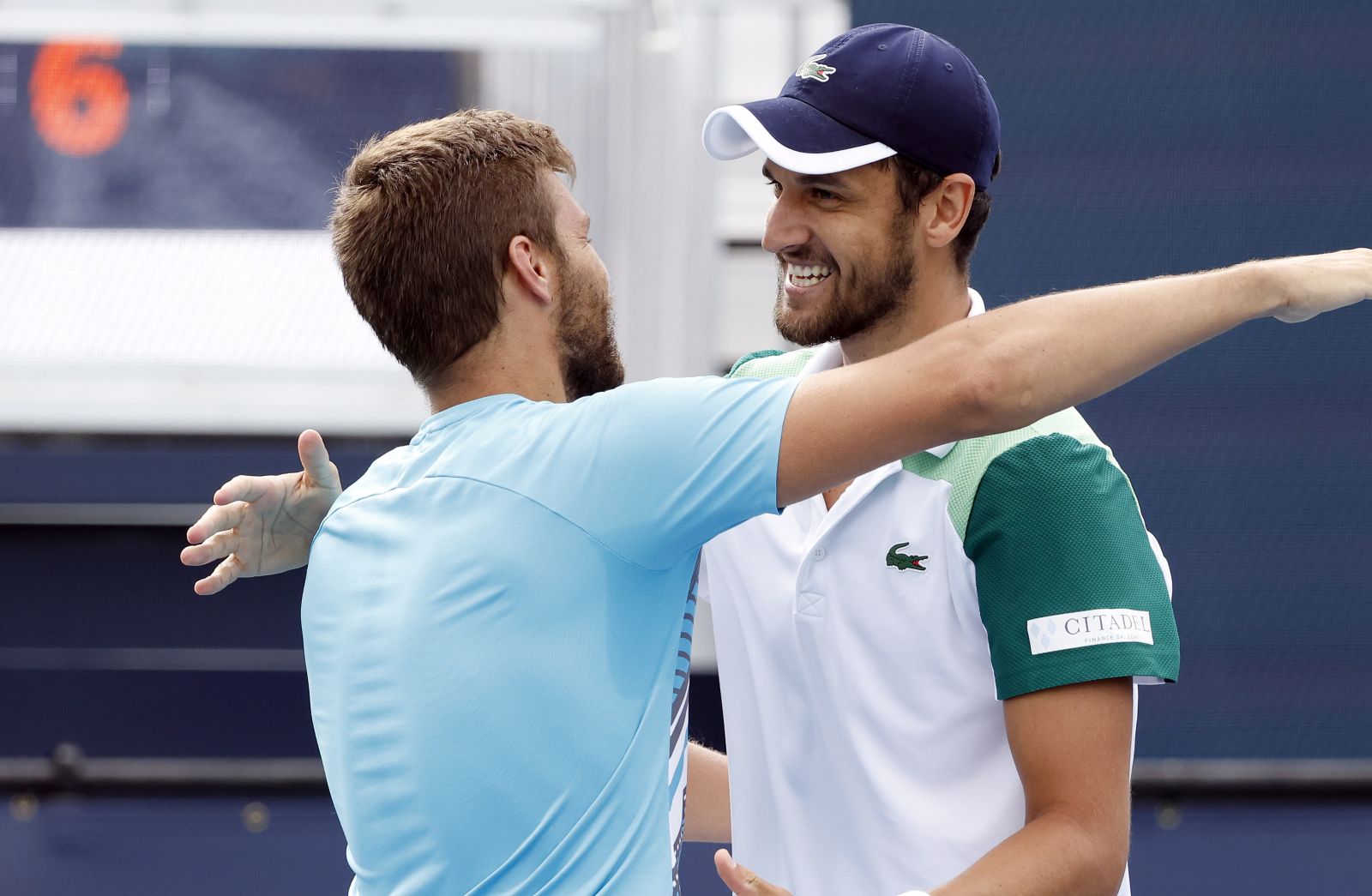 epa09114693 Nikola Mektic (L) and Mate Pavic (R) of Croatia celebrate match point against Neal Skupski and Daniel Evans of Great Britain during their Men's Doubles Finals match at the Miami Open tennis tournament in Miami Gardens, Florida, USA, 03 April 2021.  EPA/RHONA WISE