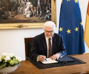 epa09154602 A handout photo made available by the German Federal Government shows German President Frank-Walter Steinmeier signing the law ratifying the Council of the EU's own resources decision, Corona reconstruction fund, in the official room of Bellevue Palace in Berlin, Germany, 23 April 2021.  EPA/STEFFEN KUGLER / GERMAN FEDERAL GOVERNMENT / HANDOUT  HANDOUT EDITORIAL USE ONLY/NO SALES