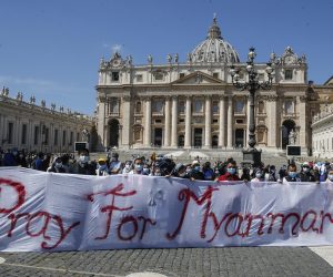 epa09158107 Faithful from Myanmar carry banners during Pope Francis' Sunday Regina Coeli prayer in Saint Peter's Square, Vatican City, 25 April 2021.  EPA/FABIO FRUSTACI
