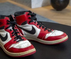 epa09164959 Shoes of former NBA player Michael Jordan Game Worn 1985 Player Sample Air Jordan 1s estimated to sell between 100,000 and 150,000 Swiss francs (CHF), during a Sotheby's preview at the boutique Buchere, in Geneva, Switzerland, 28 April 2021. Sotheby's presents 'Gamers Only', a selective online auction of game-worn sneakers from some of basketball's greatest athletes until 12 May.  EPA/SALVATORE DI NOLFI