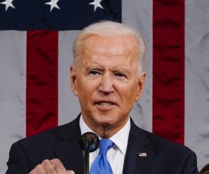 epa09166681 US President Joe Biden addresses a joint session of Congress, with Vice President Kamala Harris and House Speaker Nancy Pelosi (D-Calif.) sitting behind him, at the Capitol in Washington, DC, USA, 28 April 2021. The speech was Biden's first since taking office in January.  EPA/MELINA MARA / POOL