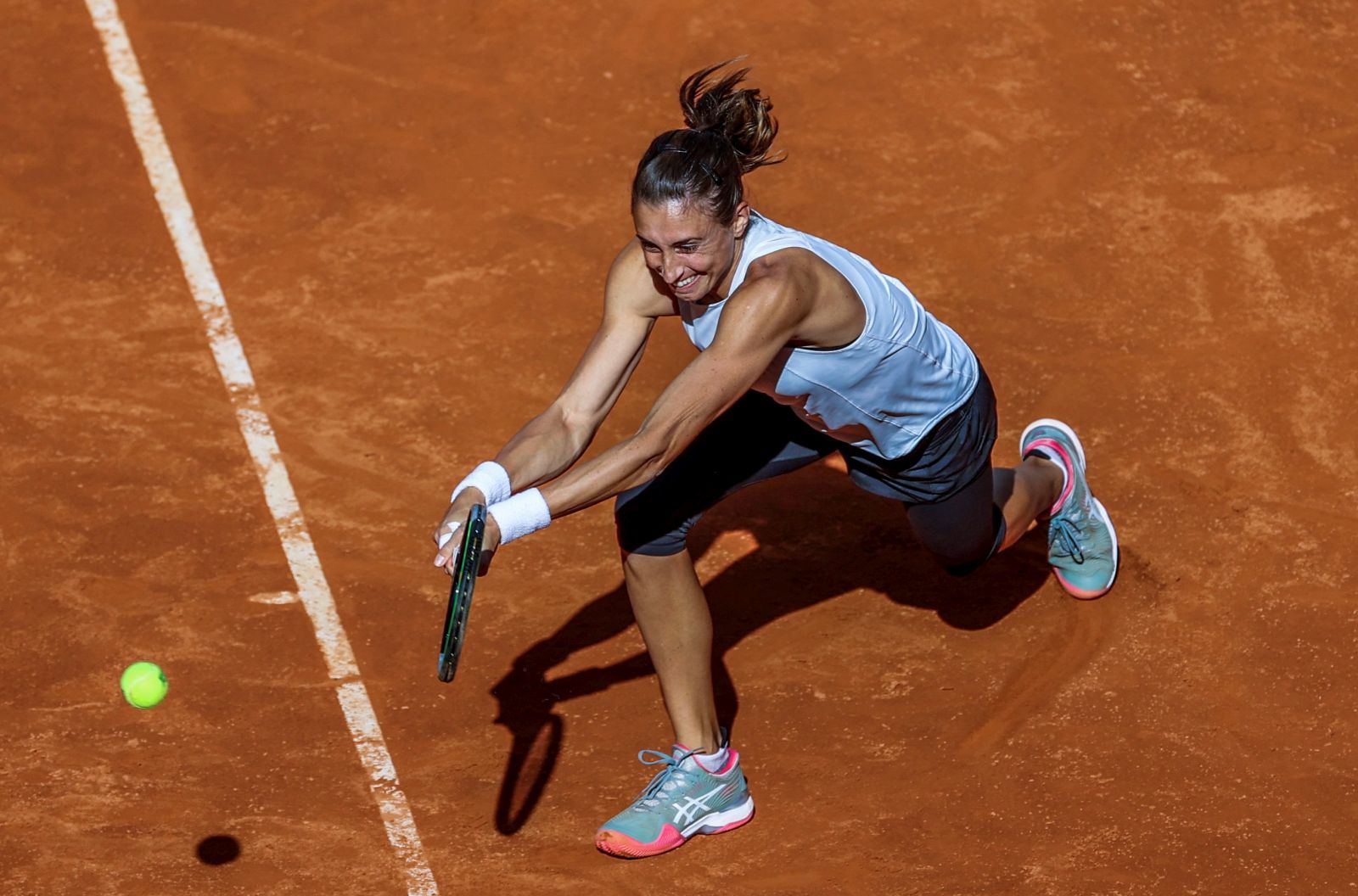 epa09168185 Petra Martic of Croatia in action during her first round match against Bernarda Pera of USA at the Mutua Madrid Open tennis tournament at Caja Magica, in Madrid, Spain, 29 April 2021.  EPA/Juanjo Martin