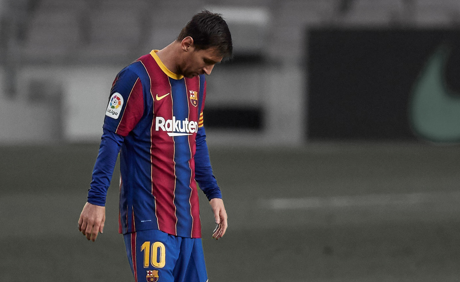 epa09168416 Barcelona's Argentinean striker Lionel Messi (L) reacts after his team concedes the second goal during the LaLiga match between Barcelona and Granada in Nou Camp stadium, Barcelona, Spain, 29 April 2021.  EPA/Alejandro Garcia
