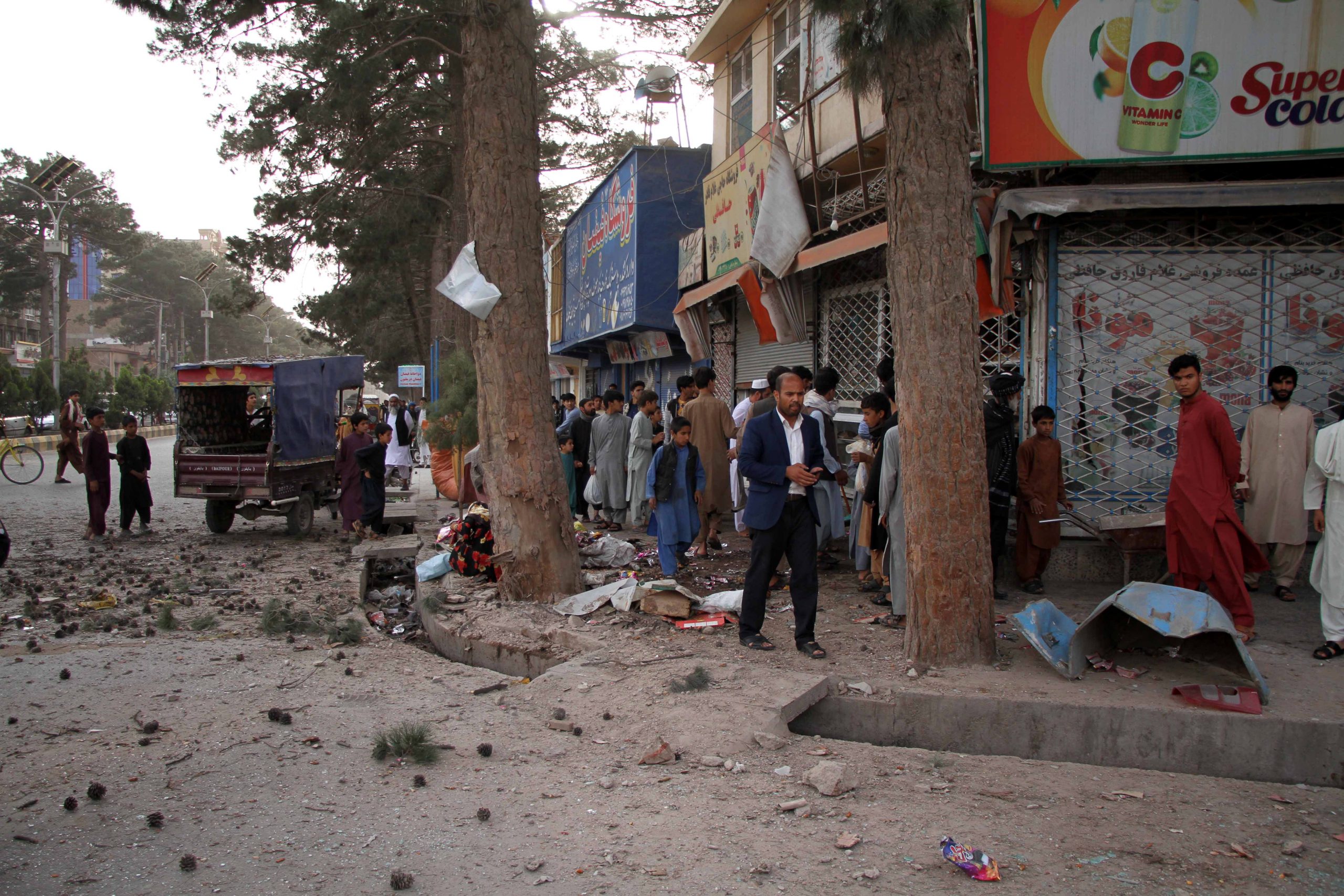 epa09170004 Afghan security officials inspect the scene of roadside mine explosion in Herat, Afghanistan, 30 April 2021. At least four civilians were wounded in roadside mine explosions in Afghanistan's western city of Herat.  EPA/JALIL REZAYEE