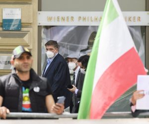 epa09171049 Robert Malley, US Special Envoy for Iran, passes by protesters of an Iranian opposition group after a bilateral meeting for the JCPOA Joint Commission Iran talks meeting in Vienna, Austria, 01 May 2021. The Joint Commission of the Joint Comprehensive Plan of Action (JCPOA) at a Deputy Foreign Ministers and Political Directors' level is chaired on behalf of EU High Representative Josep Borrell, by the EEAS Deputy Secretary General Enrique Mora and is attended by China, France, Germany, Russia, Britain and Iran.  EPA/CHRISTIAN BRUNA