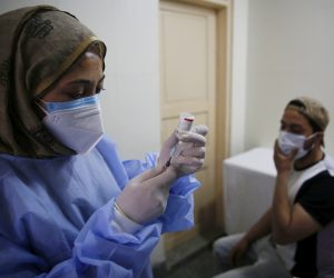 epa09171274 A medic administers the first dose of COVAXIN vaccine to youngsters at SMHS Hospital in Srinagar, the summer capital of Indian Kashmir, 01 May 2021. Government kick starts the inoculation drive to cover the 18-45 age groups. The authorities have already imposed an 84-hour lockdown from 7 pm Thursday in  20 districts of Indian Kashmir including Srinagar in view of consistent surge in Covid-19 cases. The lockdown would be lifted at 7 am on Monday (May 3).  EPA/FAROOQ KHAN