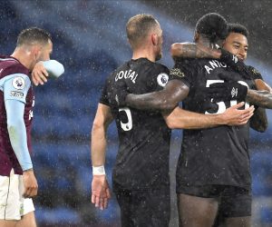 epa09176389 West Ham players celebrate after winning the English Premier League soccer match between Burnley FC and West Ham United in Burnley, Britain, 03 May 2021.  EPA/PETER POWELL / POOL EDITORIAL USE ONLY. No use with unauthorized audio, video, data, fixture lists, club/league logos or 'live' services. Online in-match use limited to 120 images, no video emulation. No use in betting, games or single club/league/player publications.