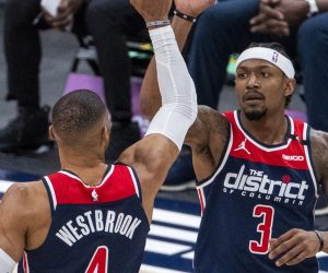 epa09176441 Washington Wizards guard Bradley Beal high fives Washington Wizards guard Russell Westbrook during the NBA game between the Indiana Pacers and the Washington Wizards at Capital One Arena in Washington, DC, USA, 03 May 2021.  EPA/SHAWN THEW SHUTTERSTOCK OUT