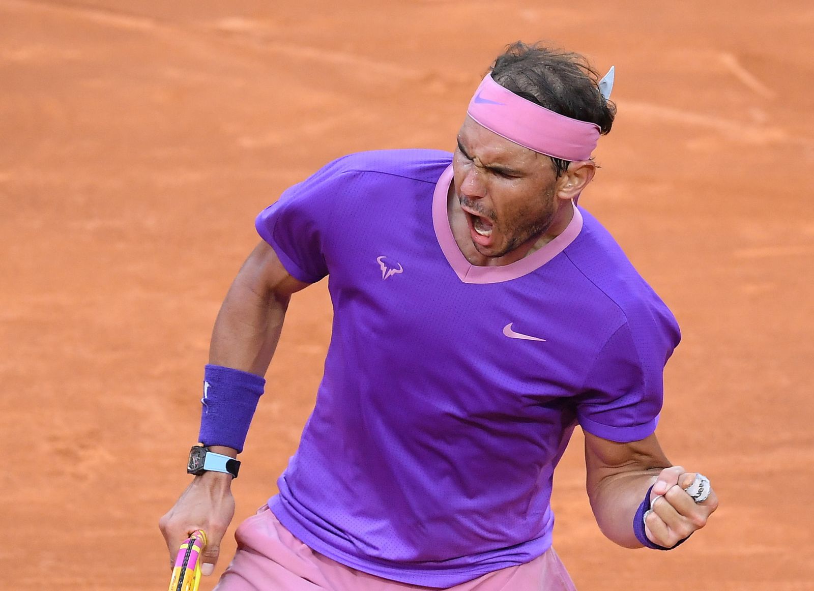 epa09205014 Rafael Nadal of Spain reacts during his men's singles final against Novak Djokovic of Serbia at the Italian Open tennis tournament in Rome, Italy, 16 May 2021.  EPA/ETTORE FERRARI