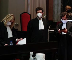 epa09228299 (L-R) EU Commission's lawyers Fanny Laune, Charles-Edouard Lambert and Rafael Jafferali at the Courthouse in Brussels, Belgium, 26 May 2021. The European Commission has sued AstraZeneca in summary proceedings because it believes, along with EU Member States, that AstraZeneca is not honouring the supply commitments it made. The Union had signed a contract with AstraZeneca for the supply of 300 million doses of its Covid-19 vaccine. However, the delivery schedules included in the purchase agreement are not respected.  EPA/STEPHANIE LECOCQ
