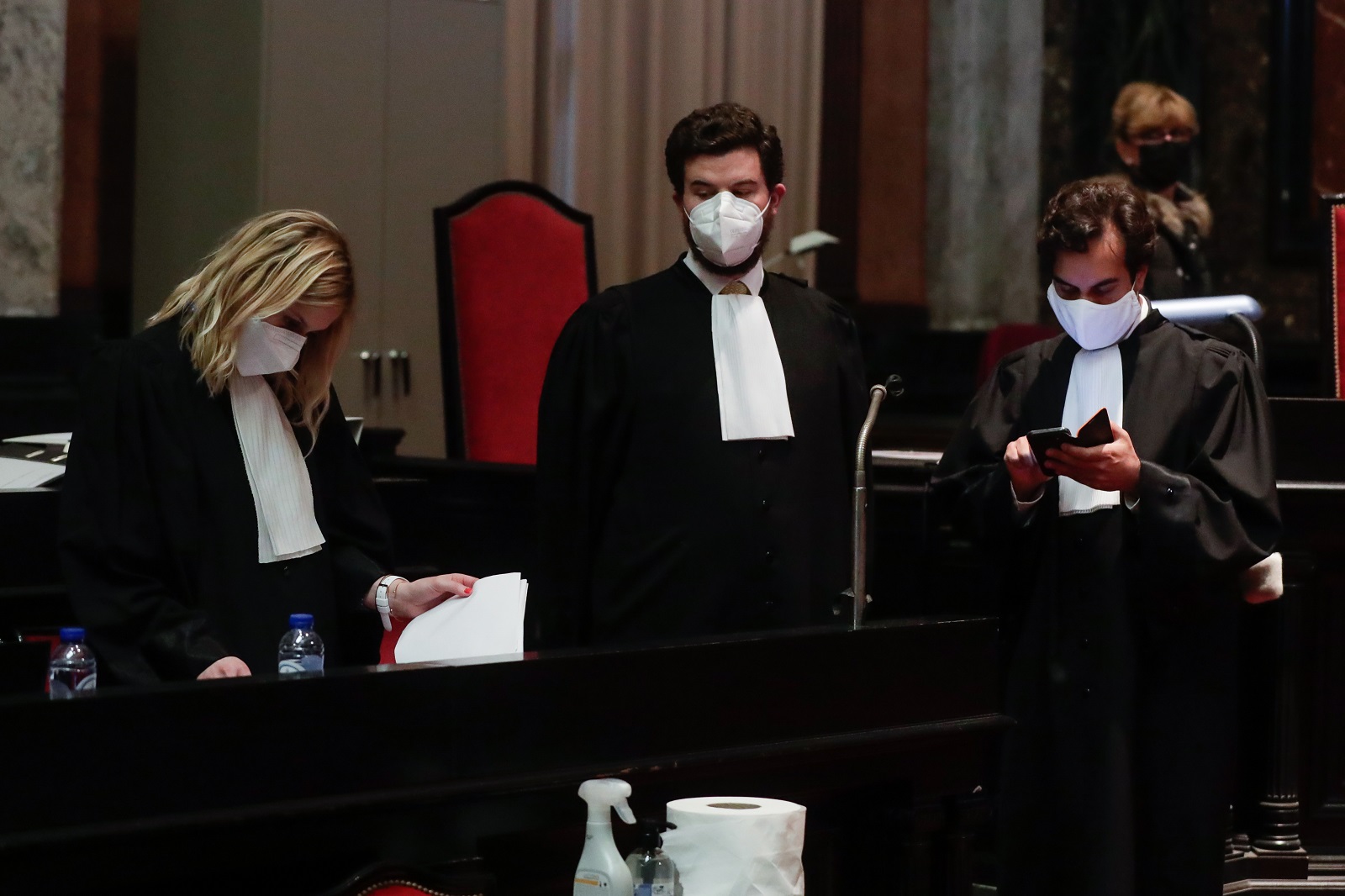 epa09228299 (L-R) EU Commission's lawyers Fanny Laune, Charles-Edouard Lambert and Rafael Jafferali at the Courthouse in Brussels, Belgium, 26 May 2021. The European Commission has sued AstraZeneca in summary proceedings because it believes, along with EU Member States, that AstraZeneca is not honouring the supply commitments it made. The Union had signed a contract with AstraZeneca for the supply of 300 million doses of its Covid-19 vaccine. However, the delivery schedules included in the purchase agreement are not respected.  EPA/STEPHANIE LECOCQ