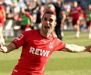 epa09235241 Cologne's Ellyes Skhiri (L) celebrates scoring the 5-1 lead during the German Bundesliga relegation play-off, second leg soccer match between Holstein Kiel and 1. FC Koeln in Kiel, Germany, 29 May 2021.  EPA/FOCKE STRANGMANN CONDITIONS - ATTENTION: The DFL regulations prohibit any use of photographs as image sequences and/or quasi-video.