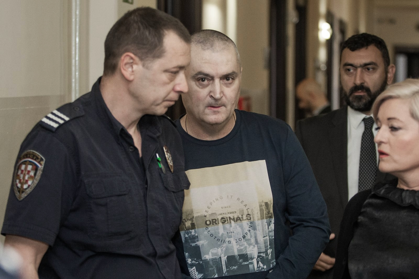 25.10.2019., Osijek - Pripremno rociste optuzenima za palez kuce Radovana Ortynskog. Milan Bulat u pratnji pravosudne policijedoveden na sudjenje. Photo: Davor Javorovic/PIXSELL