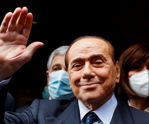 FILE PHOTO: Berlusconi arrives at Montecitorio Palace for talks on forming a new government, in Rome FILE PHOTO: Italy's former Prime Minister Silvio Berlusconi waves as he arrives at Montecitorio Palace for talks on forming a new government, in Rome, Italy, February 9, 2021. REUTERS/Yara Nardi/File Photo YARA NARDI