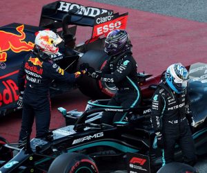 epa09185442 Dutch driver Max Verstappen of Red Bull (L) greets British driver Lewis Hamilton of Mercedes (C) after the qualifying of the Spanish Formula One Grand Prix at Montmelo racetrack in Barcelona, Spain, 08 May 2021. The Formula One Grand Prix of Spain will take place on 09 May 2021.  EPA/ALEJANDRO GARCIA