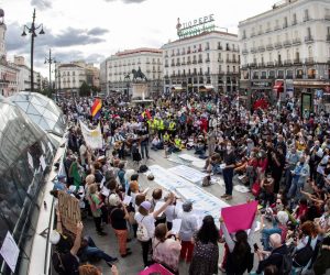 epa09202690 Hundreds of people gather at Plaza del Sol, in Madrid, central Spain, 15 May 2021. Today marks 10 years since the Spanish 15M movement (also called the Indignants Movement) was created from a huge demonstration held on 15 May 2011, in which people decided to camp overnight to protest against banks, the Spanish two-party system and the Government's austerity measures. People all over the country started to camp in different cities for days to join Madrid's 15M movement, but the main gathering took place in this square in downtown Madrid. As a result, Spanish left-party Podemos was created, and now, for the first time, they are partners with the ruling socialist party.  EPA/RODRIGO JIMENEZ