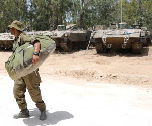 epa09217253 Israeli soldiers return home near the Gaza border, Israel, 21 May 2021. After 11 days of fighting a ceasefire came into effect between Israel and militants in Gaza strip under an Egyptian initiative for an unconditional ceasefire. At least 232 Palestinians were killed in the Israeli offensive according to Palestinian health ministry, while at least 12 Israelis killed in rocket attacks from Gaza.  EPA/ABIR SULTAN