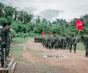 epa09236589 A handout photo made available by the National Unity Government (NGU) shows soldiers from the People's Defence Force (PDF) standing in formation during the closing ceremony of the first batch training of the PDF at an undisclosed location in Myanmar, 25 May 2021 (issued on 30 May 2021). The National Unity Government (NUG), Myanmar's shadow government, said it has finished training the first batch recruits for the People's Defence Force (PDF) to challenge Myanmar's junta. Myanmar's military authorities have labelled both NUG and PDF as terrorist groups.  EPA/NATIONAL UNITY GOVERNMENT HANDOUT EDITORS NOTE: FACES OF RECRUITS BLURRED AT SOURCE. HANDOUT EDITORIAL USE ONLY/NO SALES
