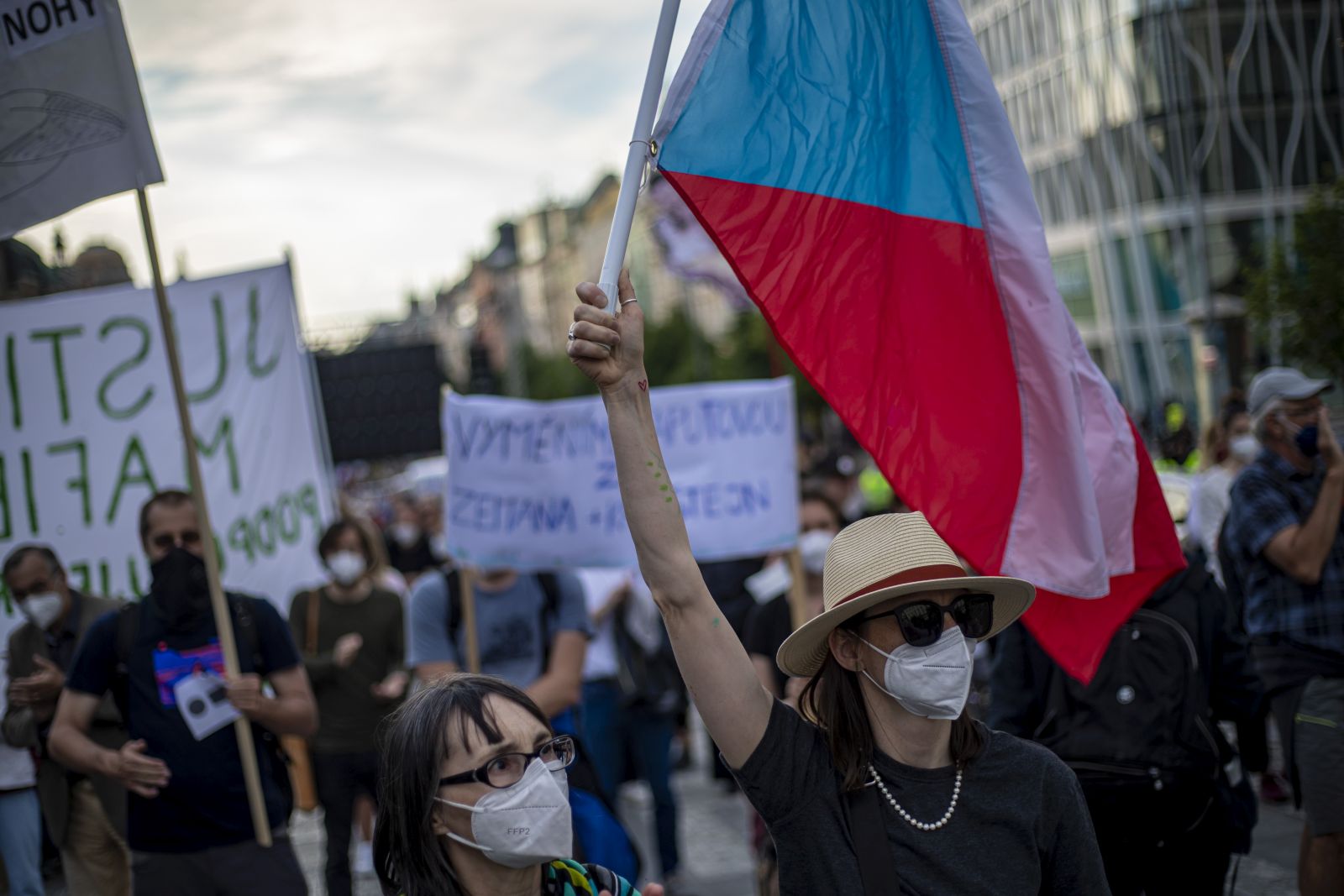 epa09241752 People attend a protest march against Czech Prime Minister Andrej Babis and Justice Minister Marie Benesova at Wenceslas Square in Prague, Czech Republic, 01 June 2021. Protesters demanded the resignation of Babis due to alleged conflicts of interest involving his former company 'Agrofert' conglomerate he founded and also the organizers demanded the resignation of justice minister, Marie Benesova, after the resignation of Supreme State Attorney Pavel Zeman. Zeman identified the pressure of Benesova as the main reason.  EPA/MARTIN DIVISEK