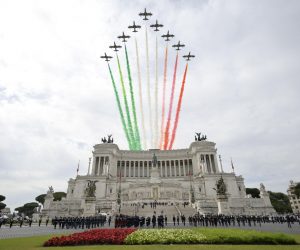 epa09242344 The Frecce Tricolori acrobatic team flies over the Milite Ignoto (Unknown Soldier) Monument at Venezia square for the celebrations of Republic Day, in Rome, Italy, 02 June 2021. The anniversary marks the proclamation of the Italian Republic in 1946.  EPA/FABIO FRUSTACI