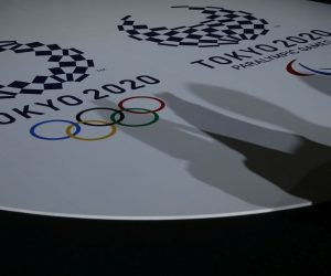 epa09244641 The emblems of the Tokyo 2020 Olympic and Paralympic Games are displayed during an unveiling event for the victory ceremonies' items including podium, music, costume and medal tray for the Olympic and Paralympic games at Ariake Arena, in Tokyo, Japan, 03 June 2021.  EPA/ISSEI KATO / POOL