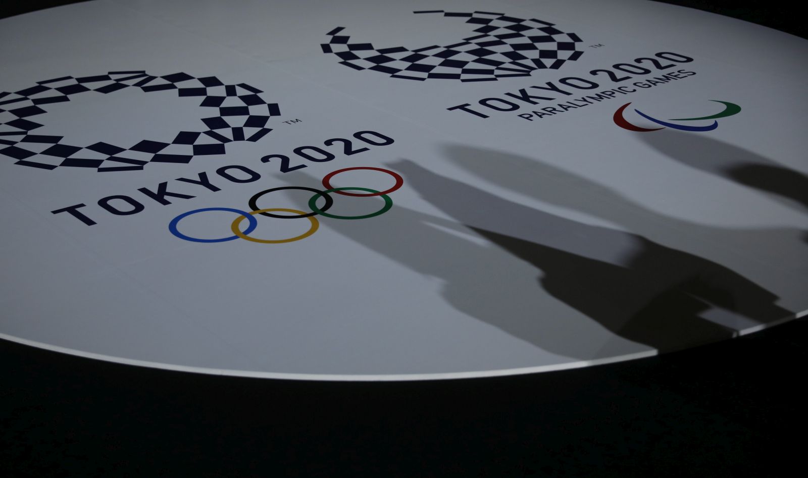 epa09244641 The emblems of the Tokyo 2020 Olympic and Paralympic Games are displayed during an unveiling event for the victory ceremonies' items including podium, music, costume and medal tray for the Olympic and Paralympic games at Ariake Arena, in Tokyo, Japan, 03 June 2021.  EPA/ISSEI KATO / POOL