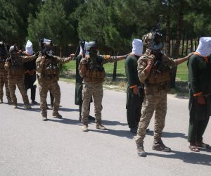 epa09244602 Afghan security officials show suspected militants to media, in Herat, Afghanistan, 03 June 2021. At least six suspected militants were captured during a special operation by national security in Herat. Violence in the country is on the rise amid stalled intra-Afghan peace talks in Doha, Qatar. The talks started in September 2020 without any breakthrough in the past nearly nine months.  EPA/JALIL REZAYEE