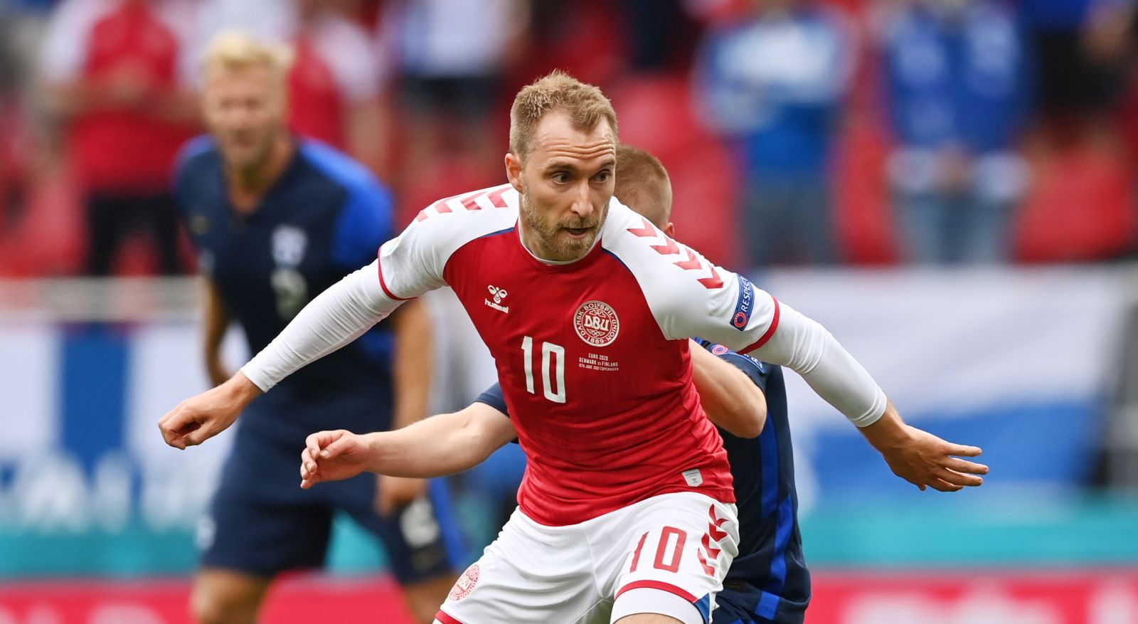epa09265254 Christian Eriksen of Denmark in action during the UEFA EURO 2020 group B preliminary round soccer match between Denmark and Finland in Copenhagen, Denmark, 12 June 2021.  EPA/Stuart Franklin / POOL (RESTRICTIONS: For editorial news reporting purposes only. Images must appear as still images and must not emulate match action video footage. Photographs published in online publications shall have an interval of at least 20 seconds between the posting.)