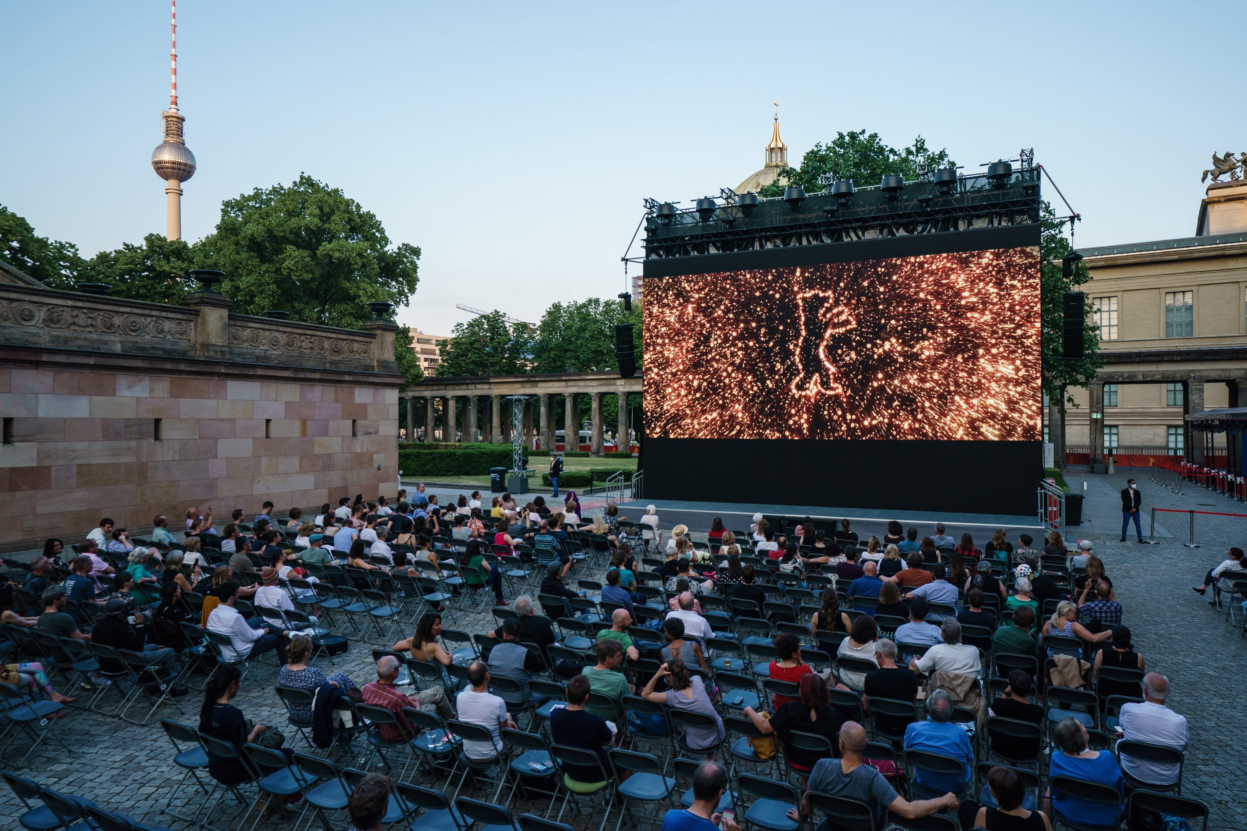 epa09280927 A general view prior to the premiere of 'Herr Bachmann und seine Klasse' (Mr. Bachmann and His Class) during the 71st Berlin International Film Festival (Berlinale) Summer Special at the Museumsinsel (Museum Island) outdoor cinema in Berlin, Germany, 17 June 2021. The documentary film is presented in the festival's Official Competition. Due to the coronavirus COVID-19 pandemic, the 71st Berlinale is taking place in two stages: a virtual Industry Event, that was held from 01 to 05 March 2021, and the Summer Special for the general public running from 09 to 20 June 2021 as an outdoor-only event.  EPA/CLEMENS BILAN / POOL