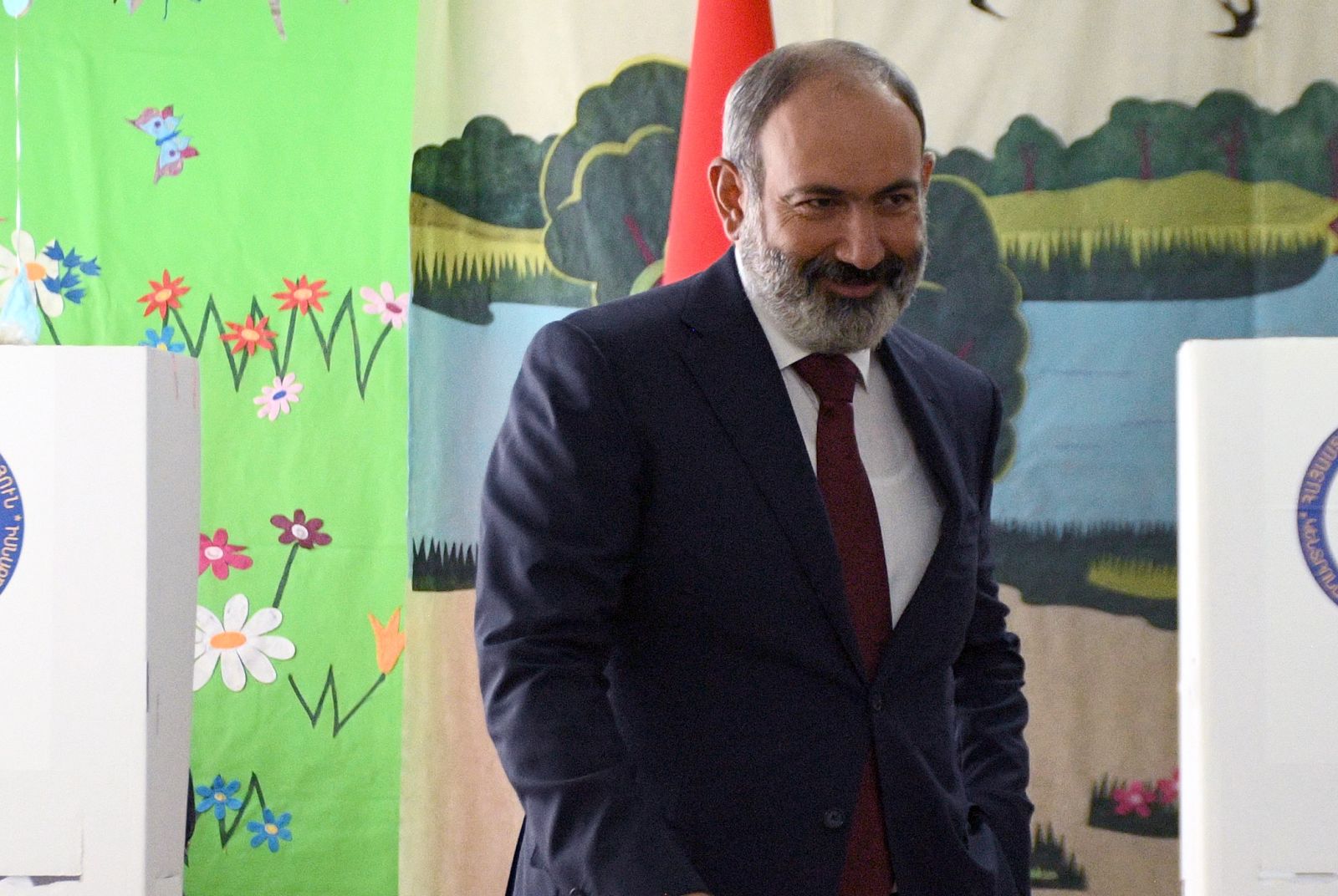 epa09287666 Armenian Prime Minister Nikol Pashinyan casts his ballot at a polling station in Yerevan, Armenia, 20 June 2021. Armenians headed to the polls for early parliamentary election in which candidates Prime Minister Nikol Pashinyan and former President Robert Kocharyan are considered the favorites. The early parliamentary election caused by a political crisis in the country after defeat in the Nagorno-Karabakh conflict with Azerbaijan.  EPA/NAREK ALEKSANYAN