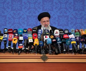 epa09290325 Iranian President-elect Ebrahim Raisi speaks during his first press conference after winning the presidential election, in Tehran, Iran, 21 June 2021. Raisi said that his government will follow the nuclear negotiations with world powers but not for a long time, adding that US must lift the sanctions and return to JCPOA deal.  EPA/ABEDIN TAHERKENAREH