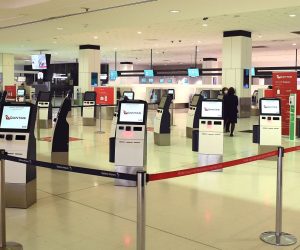 epa09294614 The Qantas check in counter is seen at Sydney International Airport, in Sydney, New South Wales, Australia, 23 June 2021. New Zealand has stopped quarantine-free travel with New South Wales for at least 72 hours after the Bondi COVID-19 cluster in Sydney's east rose.  EPA/DAN HIMBRECHTS AUSTRALIA AND NEW ZEALAND OUT