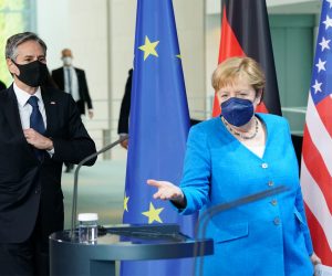 epa09295565 German Chancellor Angela Merkel (R) and US Secretary of State Antony Blinken arrive for a joint press conference at the Chancellery in Berlin, Germany, 23 June 2021. US Secretary of State Antony Blinken visits Berlin on the occasion of his participation in the 2nd Berlin Libya Conference.  EPA/CLEMENS BILAN / POOL