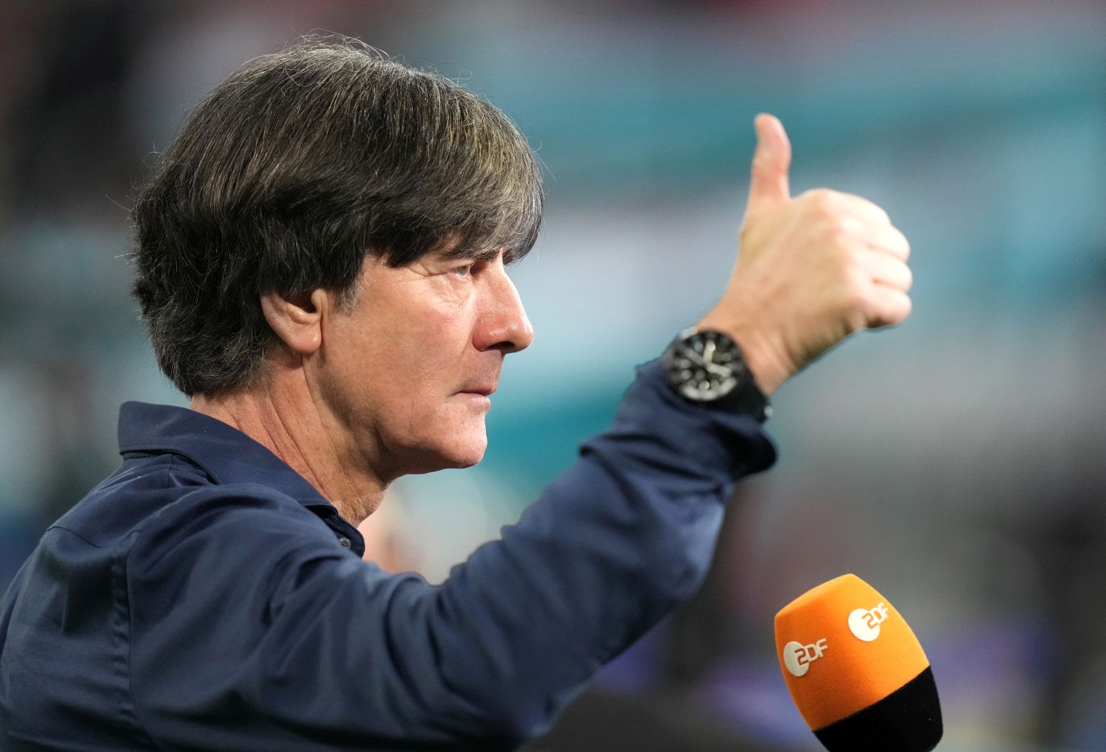 epa09296535 Head coach of Germany Joachim Loew gives the thumb up before the UEFA EURO 2020 group F preliminary round soccer match between Germany and Hungary in Munich, Germany, 23 June 2021.  EPA/Matthias Schrader / POOL (RESTRICTIONS: For editorial news reporting purposes only. Images must appear as still images and must not emulate match action video footage. Photographs published in online publications shall have an interval of at least 20 seconds between the posting.)