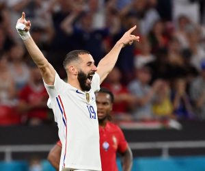 epa09297150 Karim Benzema of France celebrates scoring the 2-1 during the UEFA EURO 2020 group F preliminary round soccer match between Portugal and France in Budapest, Hungary, 23 June 2021.  EPA/Tibor Illyes / POOL (RESTRICTIONS: For editorial news reporting purposes only. Images must appear as still images and must not emulate match action video footage. Photographs published in online publications shall have an interval of at least 20 seconds between the posting.)