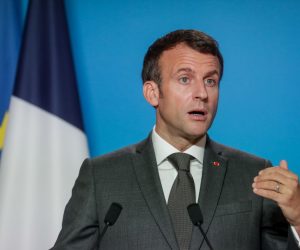 epa09300731 French President Emmanuel Macron gives a press conference at the end of the second day of an EU summit at the European Council building in Brussels, Belgium, 25 June 2021.  EPA/STEPHANIE LECOCQ/ POOL