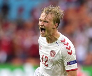 epa09303617 Kasper Dolberg of Denmark celebrates after scoring the 2-0 lead during the UEFA EURO 2020 round of 16 soccer match between Wales and Denmark in Amsterdam, Netherlands, 26 June 2021.  EPA/Olaf Kraak / POOL (RESTRICTIONS: For editorial news reporting purposes only. Images must appear as still images and must not emulate match action video footage. Photographs published in online publications shall have an interval of at least 20 seconds between the posting.)