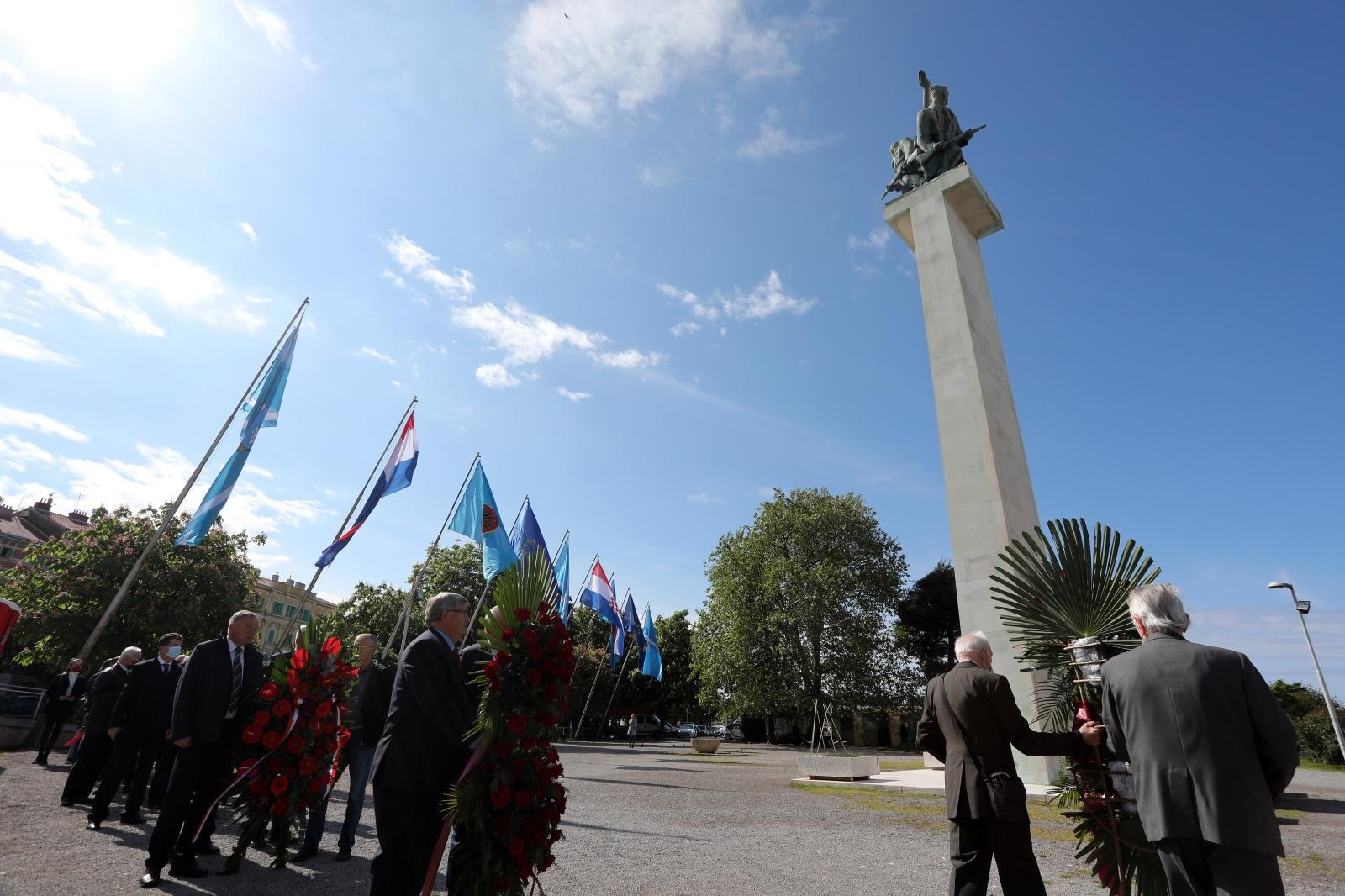 03.05.2021., Rijeka - Obiljezavanje Dana oslobodjenja Rijeke. Predstavnici politickih stranaka, kandidati za gradonacelnike, predstavnici SUBNOR-a, MUP-a, Grada i Zupanije polozili su vijence i upalili svijece pred spomenikom oslobodjenja na Delti. Nazocili su: Vojko Obersnel, Zlatko Komadina, Nikola Ivanis, Marko Filipovic, Katarina Peovic, JHosip Ostrogovic, Zlatko Komadina.
 Photo: Goran Kovacic/PIXSELL
