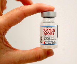 FILE PHOTO: SOMOS Community Care administers Moderna COVID-19 Vaccine at pop-up site in New York FILE PHOTO: A healthcare worker holds a vial of the Moderna COVID-19 Vaccine at a pop-up vaccination site operated by SOMOS Community Care during the coronavirus disease (COVID-19) pandemic in Manhattan in New York City, New York, U.S., January 29, 2021. REUTERS/Mike Segar/File Photo MIKE SEGAR