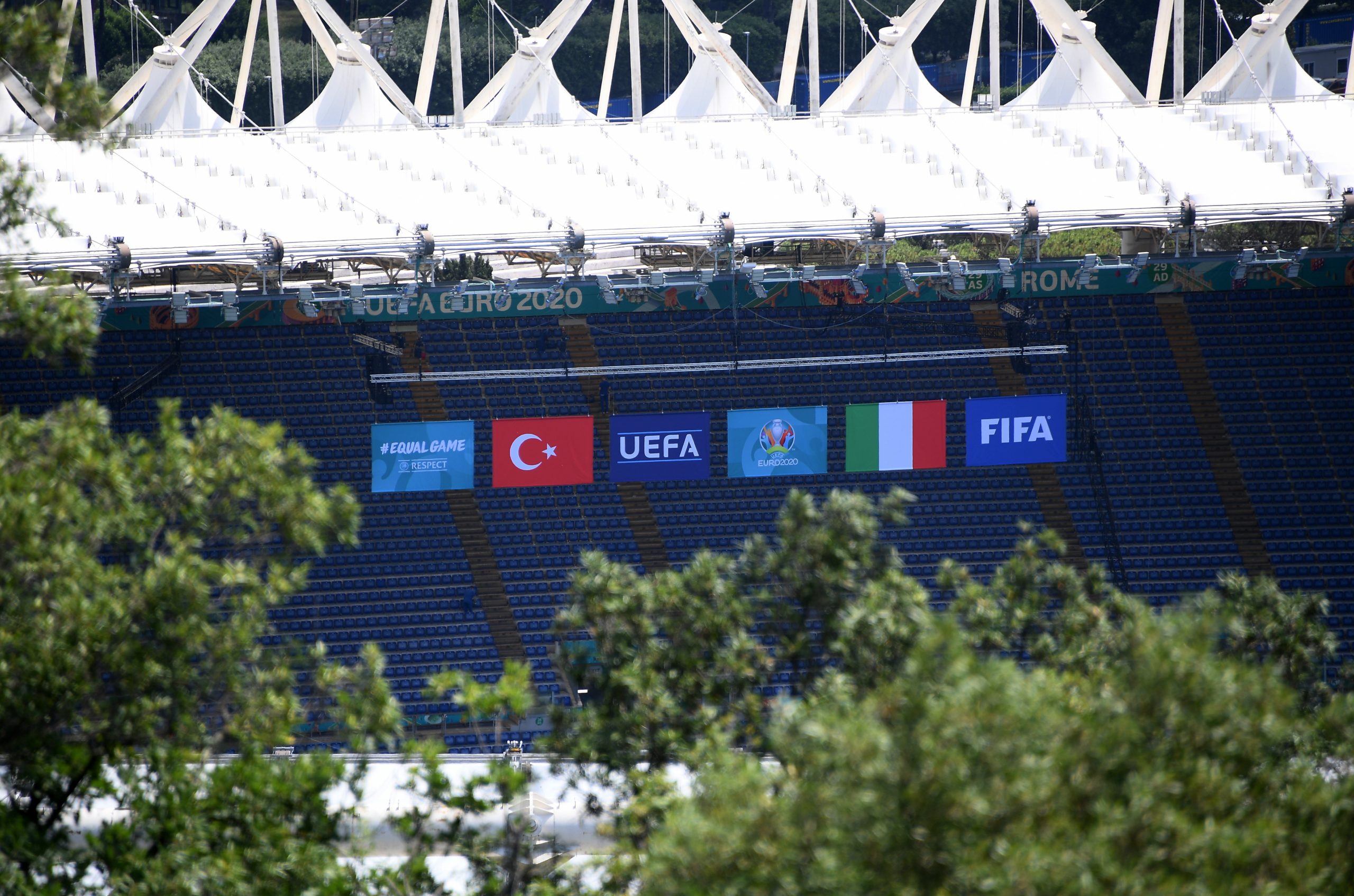 Euro 2020 - Rome's Stadio Olimpico prepares for opening match Soccer Football - Euro 2020 - Rome's Stadio Olimpico prepares for opening match - Stadio Olimpico, Rome, Italy - June 9, 2021 General view of the flags inside to the stadium ahead of Euro 2020 REUTERS/Alberto Lingria ALBERTO LINGRIA