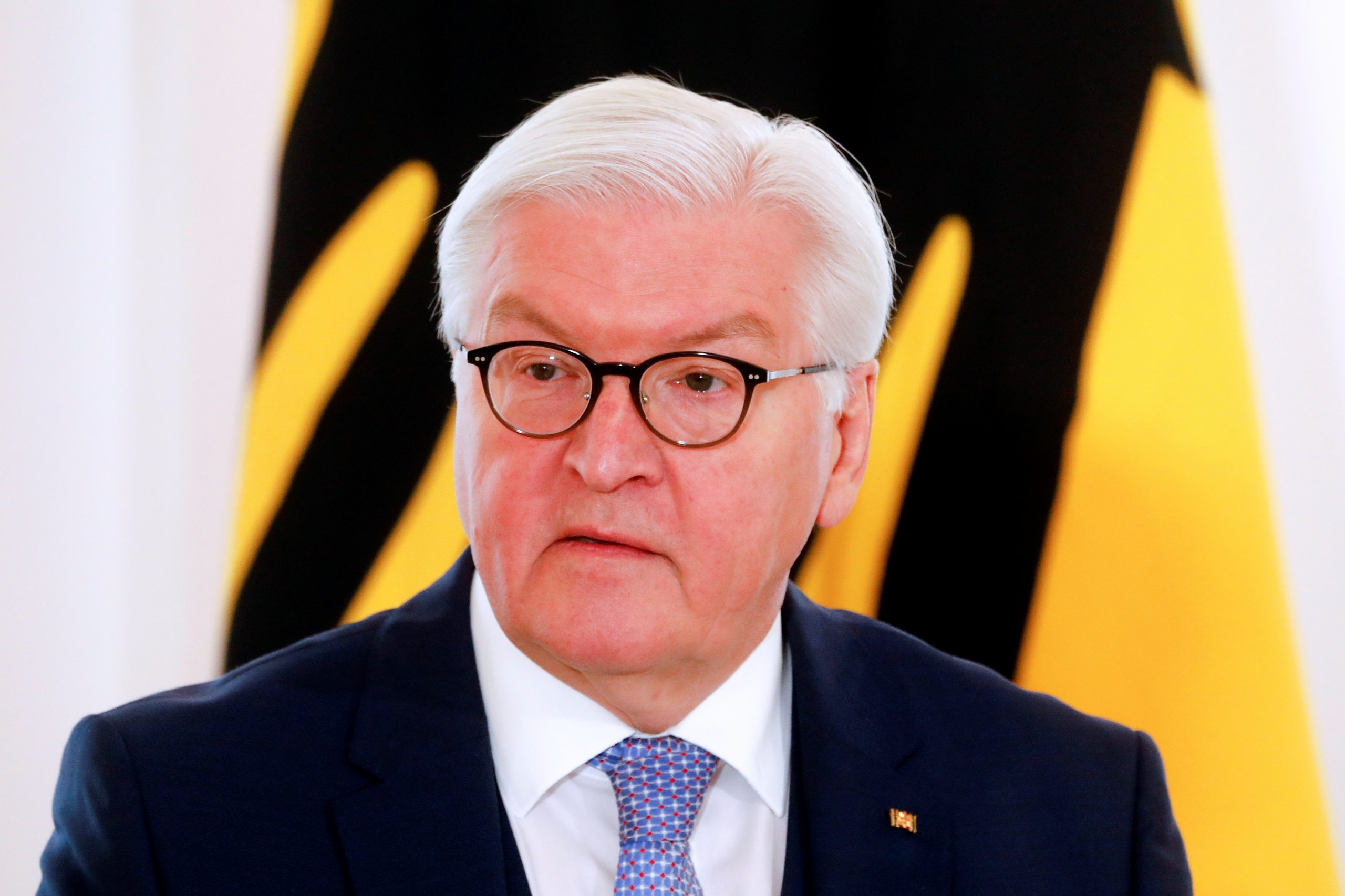 German President Steinmeier awards residents for their commitment during pandemic in Berlin German President Frank Walter Steinmeier attends a ceremony to award people with the state's Cross of Merit for their services during the coronavirus pandemic at Bellevue Palace in Berlin, Germany March 26, 2021. Markus Schreiber/Pool via REUTERS POOL