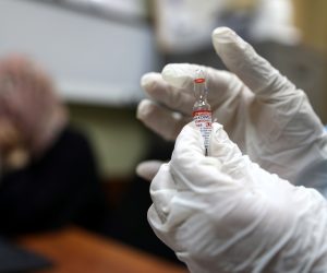 epa09259617 A Palestinian medical worker prepares a dose of Pfizer-BioNTecha vaccine against covid19 at the Palestinian Medical center in the West Bank city of Dura, 10 June 2021. According to Palestinian Health Minister Mai Alkaila 404,142 people were vaccinated in the West Bank and the Gaza Strip.  EPA/ABED AL HASHLAMOUN