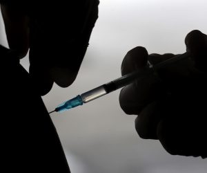epa09275261 An Indonesian health worker injects a dose of Sinovac COVID-19 vaccine to people aged 18 and above during a COVID-19 vaccination drive at a parking lot of Indonesia's University Hospital (RSUI) in Jakarta, Indonesia, 16 June 2021. The RSUI has already given COVID-19 vaccination to 40,753 people amid rising cases of the infectious disease. Indonesia has recorded more than 1,900,000 COVID-19 cases since the beginning of the pandemic.  EPA/BAGUS INDAHONO