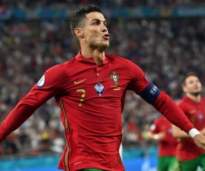 epa09296891 Cristiano Ronaldo of Portugal celebrates after scoring the 1-0 by penalty during the UEFA EURO 2020 group F preliminary round soccer match between Portugal and France in Budapest, Hungary, 23 June 2021.  EPA/Tibor Illyes / POOL (RESTRICTIONS: For editorial news reporting purposes only. Images must appear as still images and must not emulate match action video footage. Photographs published in online publications shall have an interval of at least 20 seconds between the posting.)