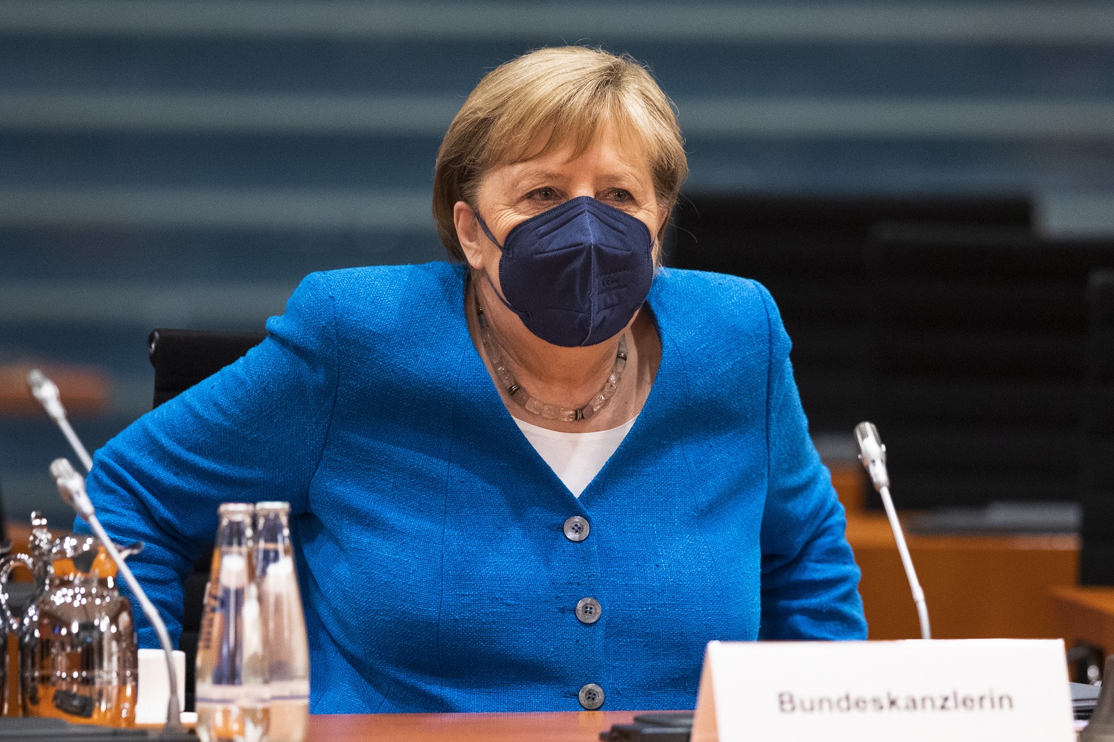 epa09312692 German Chancellor Angela Merkel arrives for the weekly government cabinet meeting in Berlin, Germany, 30 June 2021. Germany has eliminated many of its pandemic lockdown measures as coronavirus disease (COVID-19) infection rates have plummeted nationwide to single digits and over 50 percent of the population has received a first dose of a vaccine. However authorities are becoming increasingly concerned over a possible fourth wave brought on by the spread of the Delta variant.  EPA/MAJA HITIJ / POOL